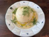 Yeast dumpling stuffed with porcini mushrooms and sheep cheese, dill sauce
